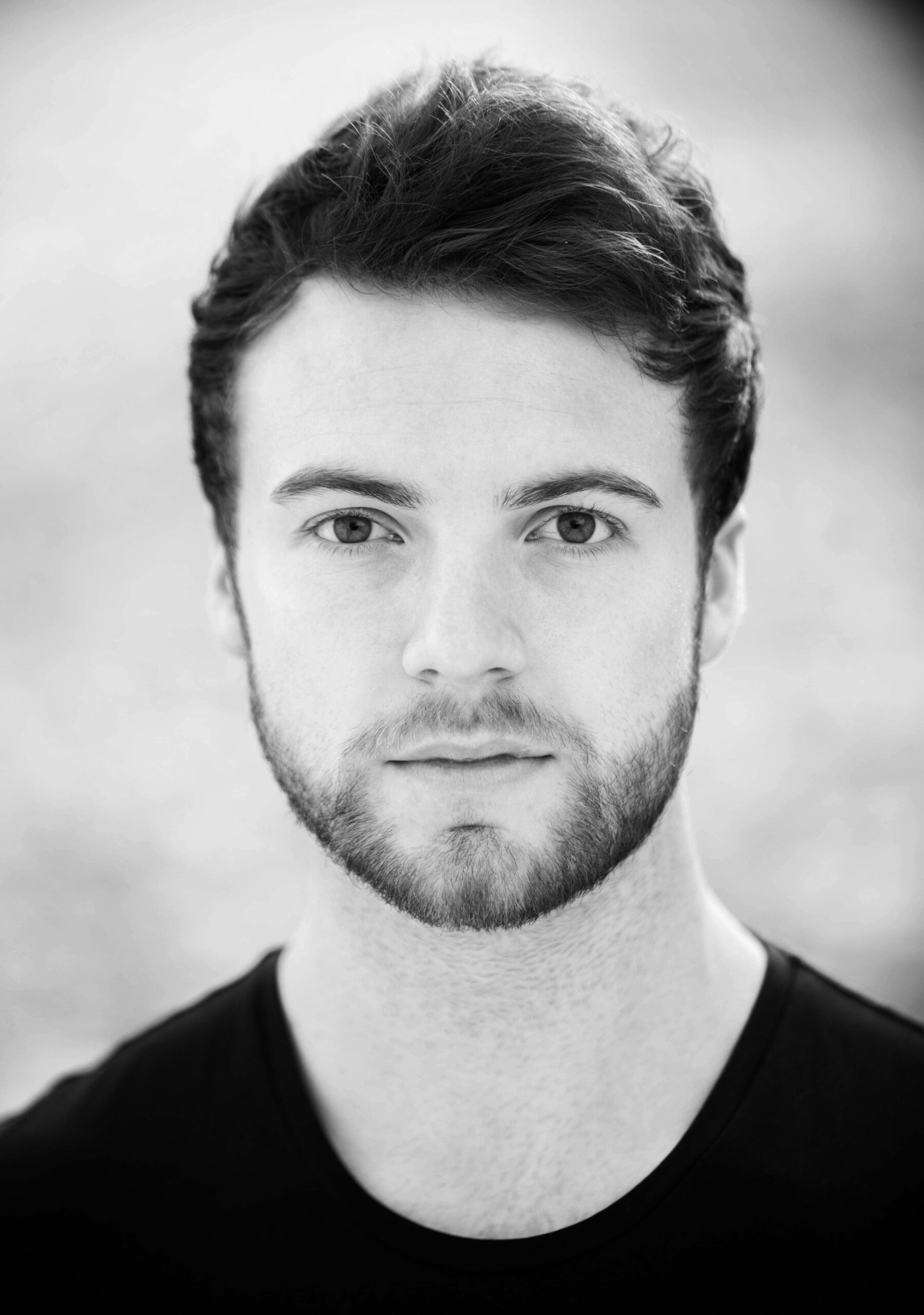 Black and white headshot photography of a male actor on location in Cardiff