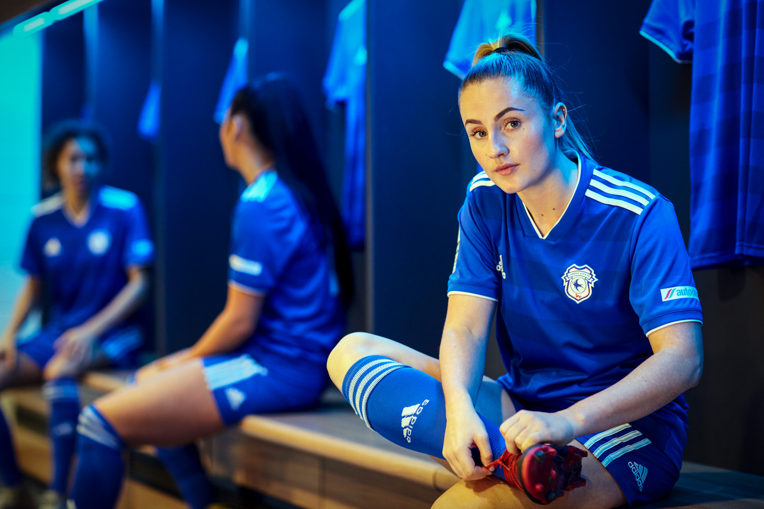 commercial sports portrait of female cardiff city football player for product photography campaign