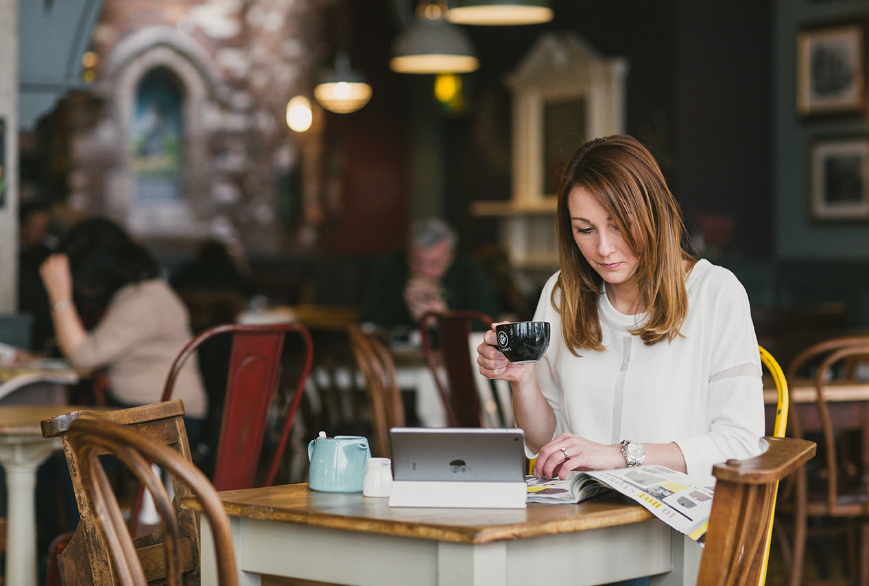 Female model drinking coffee on commercial lifestyle photography photoshoot for Cardiff based coffee shop coffee 1